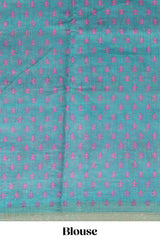 White tie & dye striped linen cotton saree with contrast zari border and printed blouse
