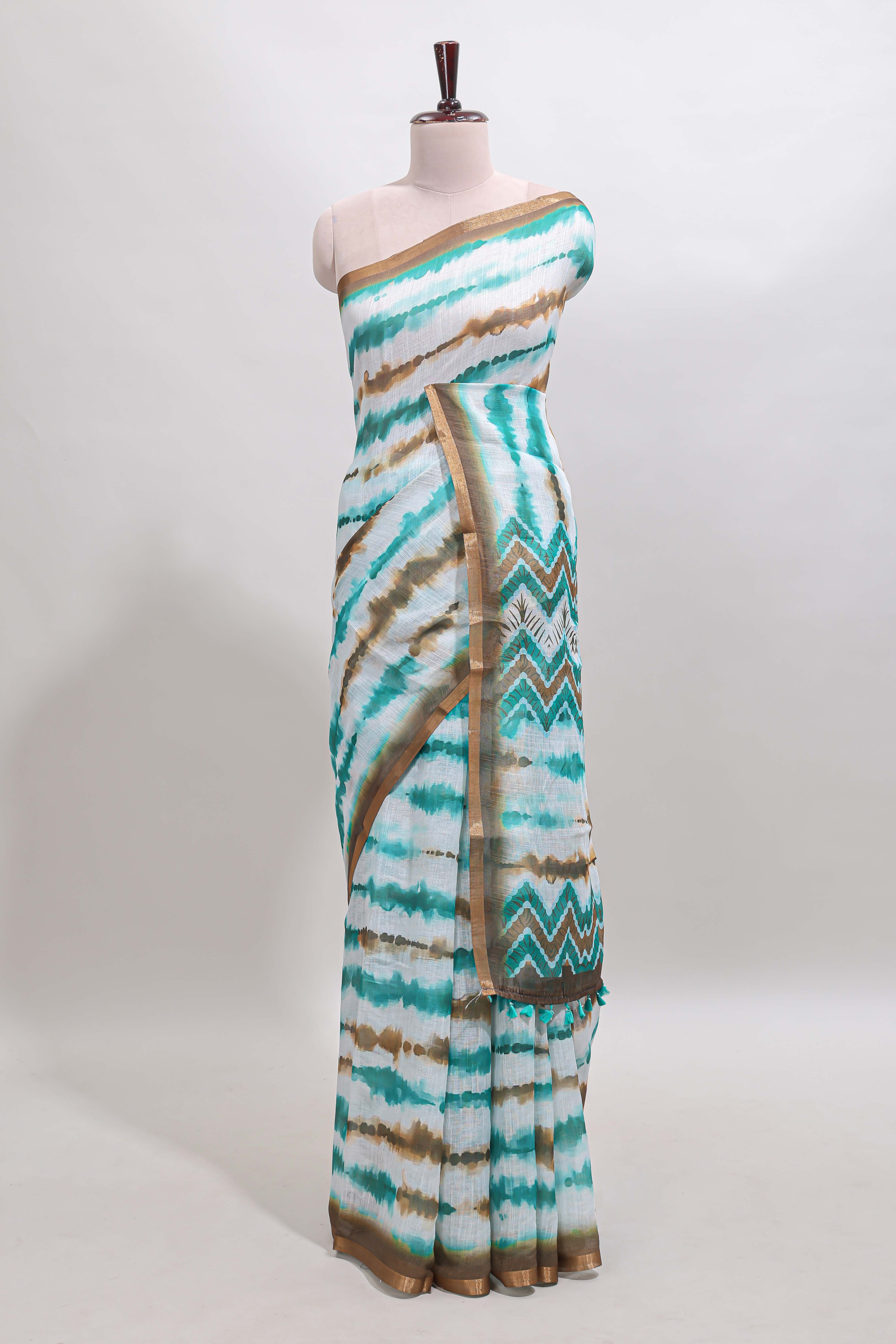 White tie & dye striped linen cotton saree with contrast zari border and printed blouse