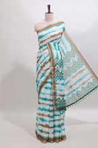 White tie & dye striped linen cotton saree with contrast zari border and printed blouse