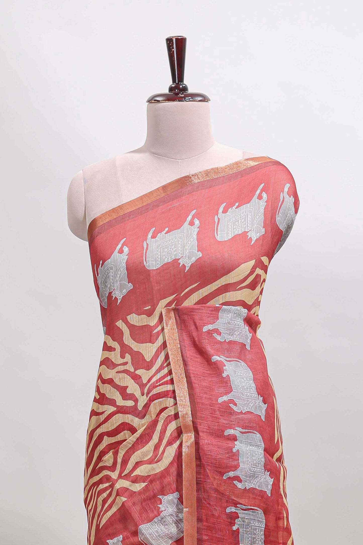 Peach pichwai cow prints & Zebra inspired pattern linen cotton saree with self zari border and matching blouse