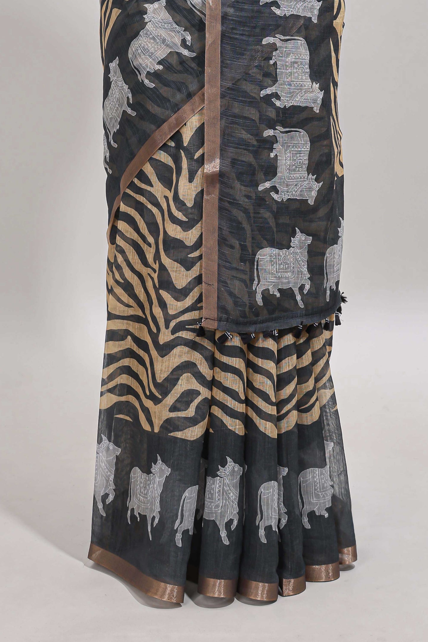 Grey pichwai cow prints & Zebra inspired pattern linen cotton saree with self zari border and matching blouse