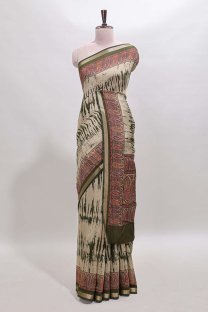 Brown shibori print linen cotton saree with contrast green zari border and printed blouse