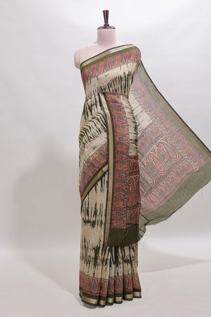 Brown shibori print linen cotton saree with contrast green zari border and printed blouse