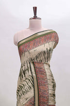 Brown shibori print linen cotton saree with contrast green zari border and printed blouse