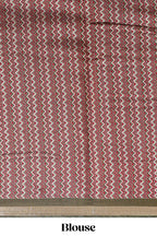 Brown shibori print linen cotton saree with contrast green zari border and printed blouse