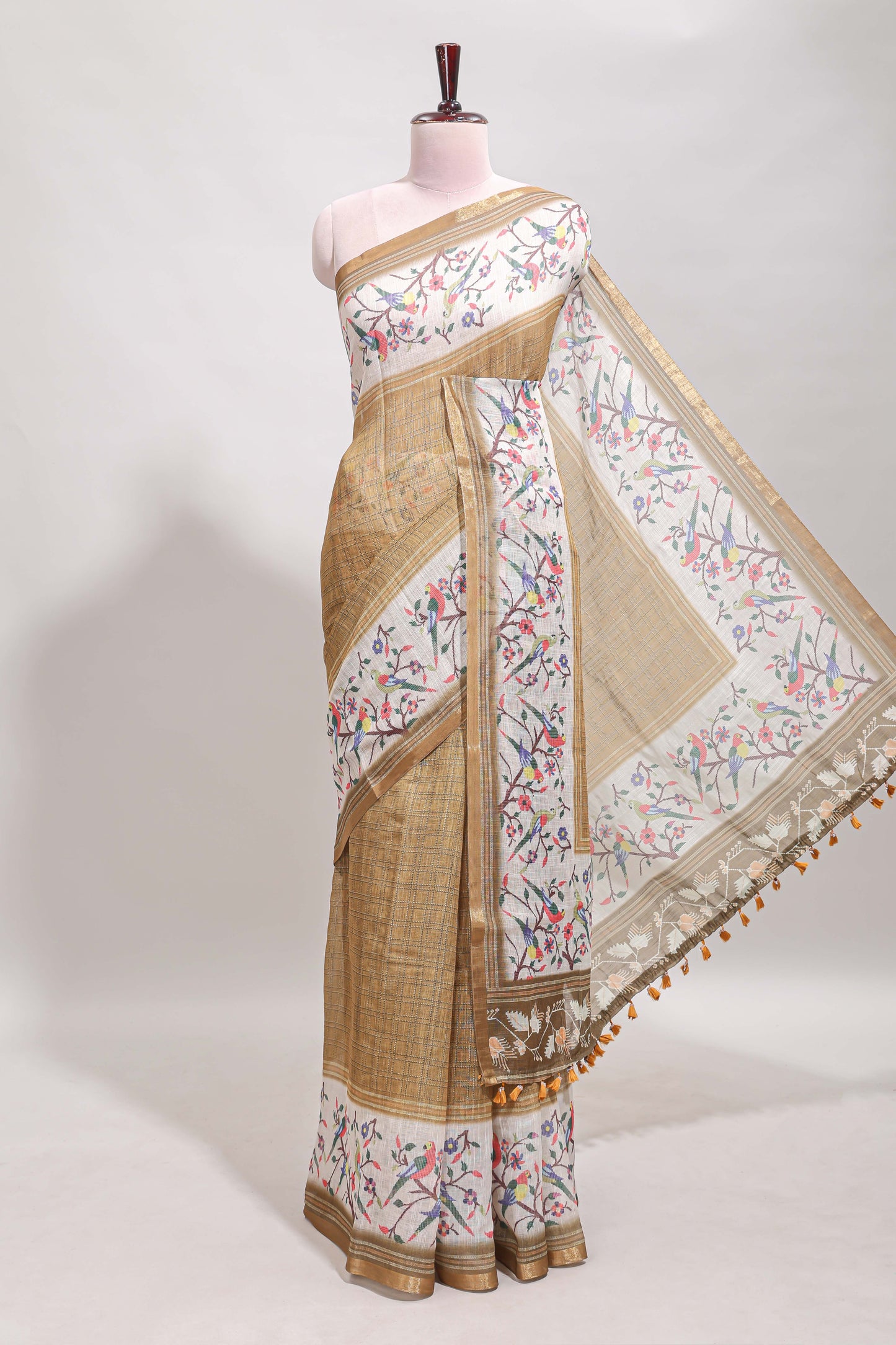 Sandal floral & bird motif bottom with checked body linen cotton saree, self zari border and matching blouse