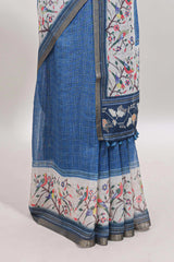 Blue floral & bird motif bottom with checked body linen cotton saree, self zari border and matching blouse