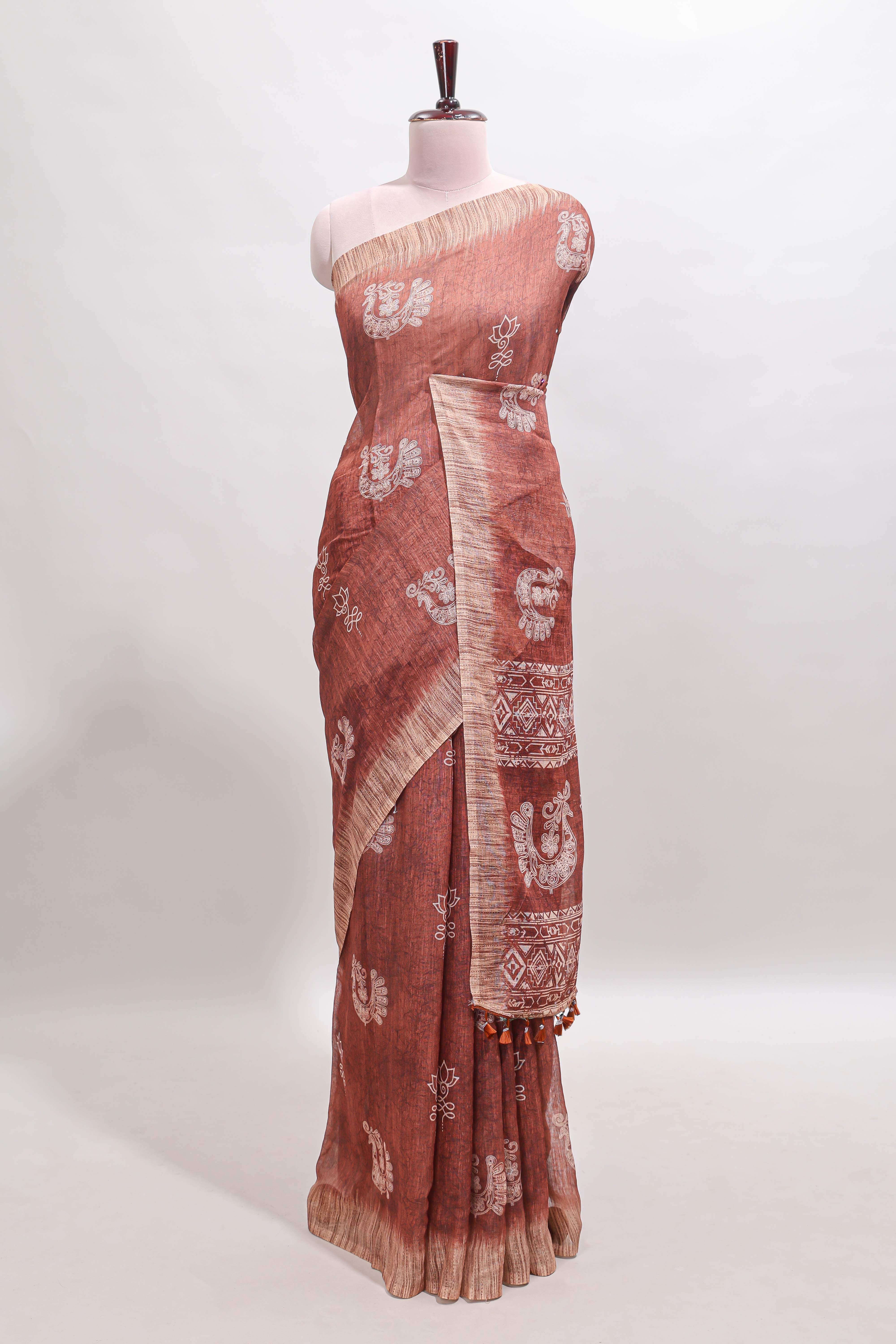 Brown peacock & floral motifs linen cotton saree with contrast border and matching blouse