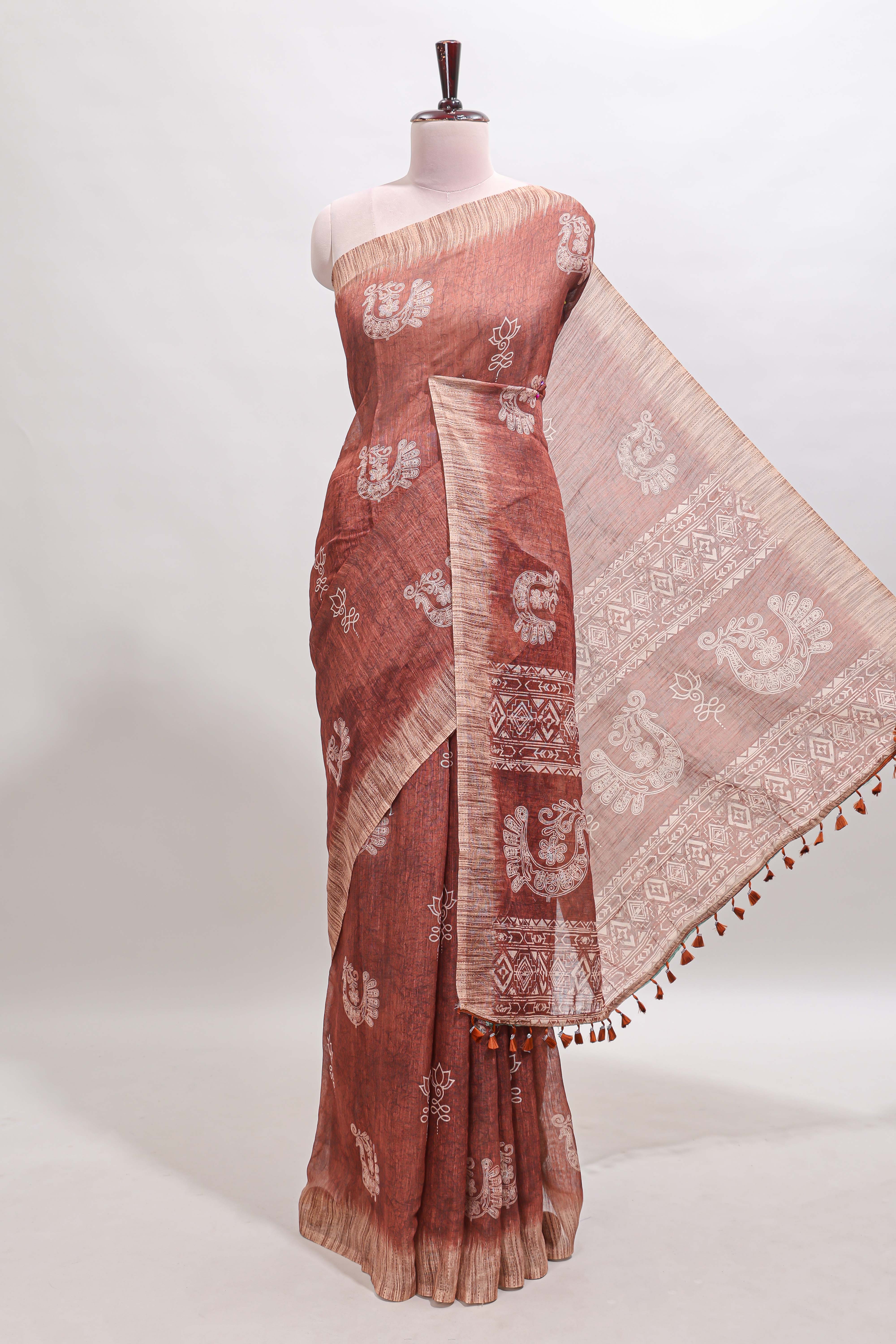 Brown peacock & floral motifs linen cotton saree with contrast border and matching blouse