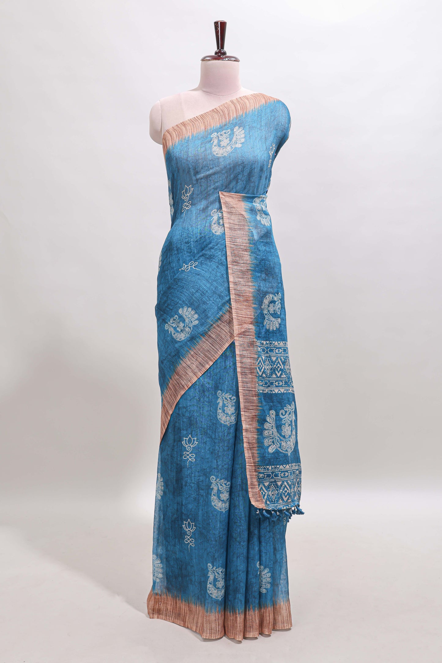 Blue peacock & floral motifs linen cotton saree with contrast border and matching blouse