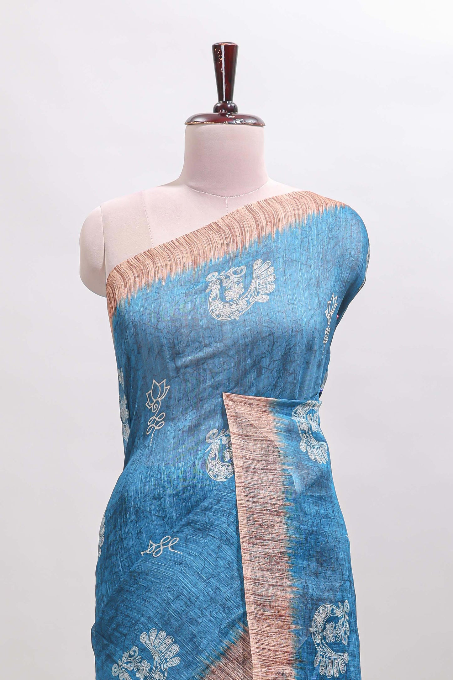 Blue peacock & floral motifs linen cotton saree with contrast border and matching blouse