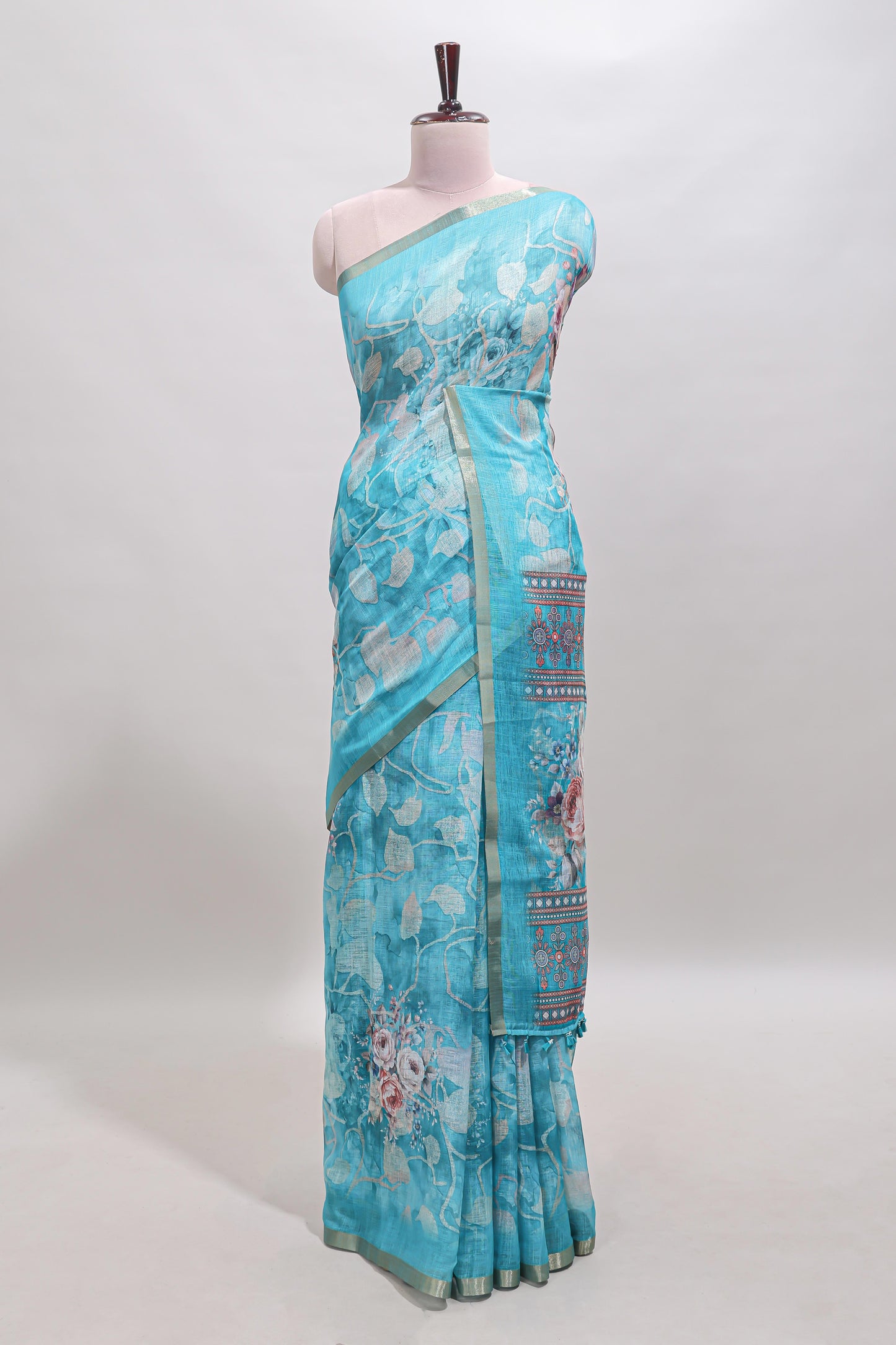 Blue floral design linen cotton saree with self zari border and matching blouse