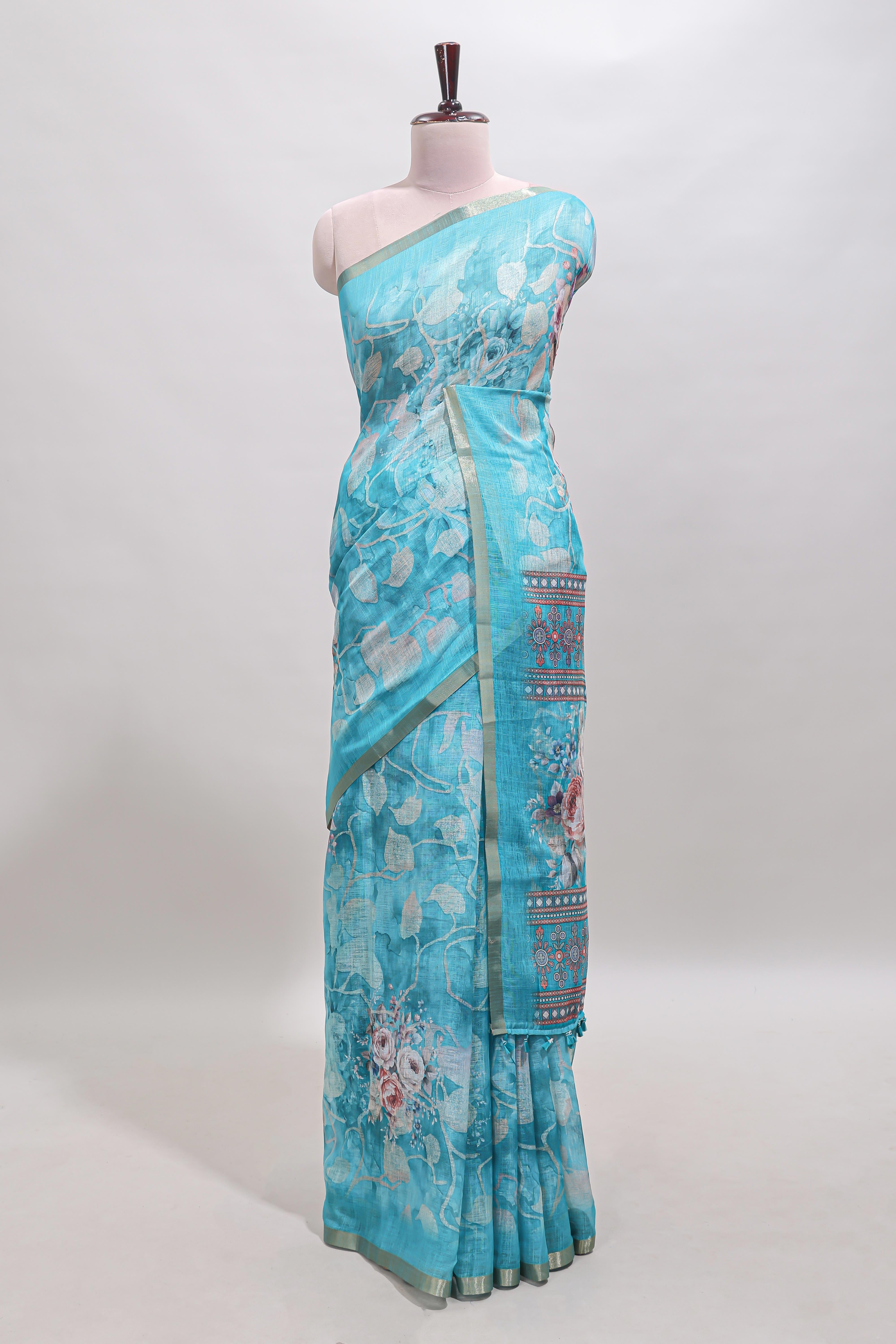 Blue floral design linen cotton saree with self zari border and matching blouse
