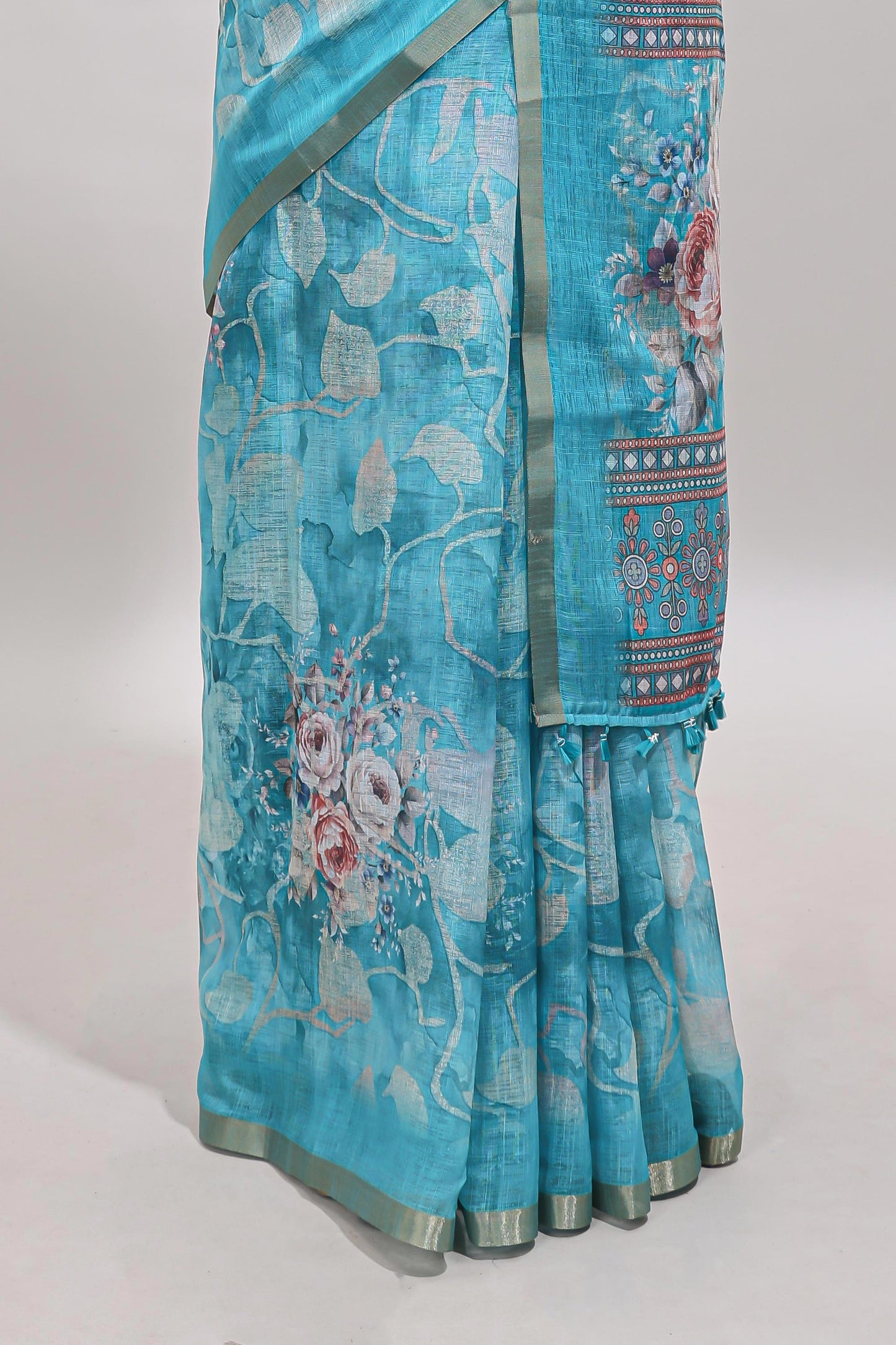 Blue floral design linen cotton saree with self zari border and matching blouse
