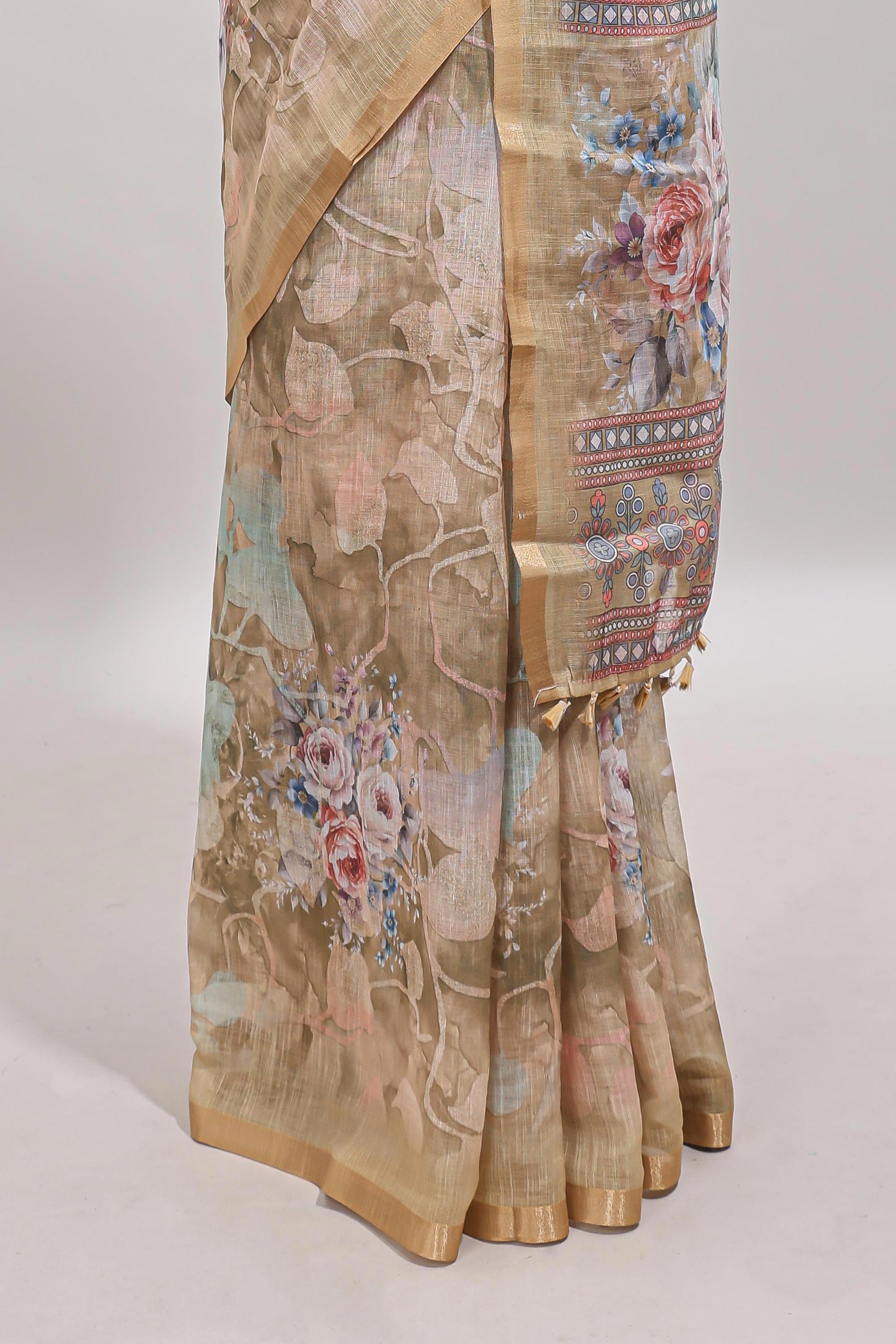 Beige floral design linen cotton saree with self zari border and matching blouse