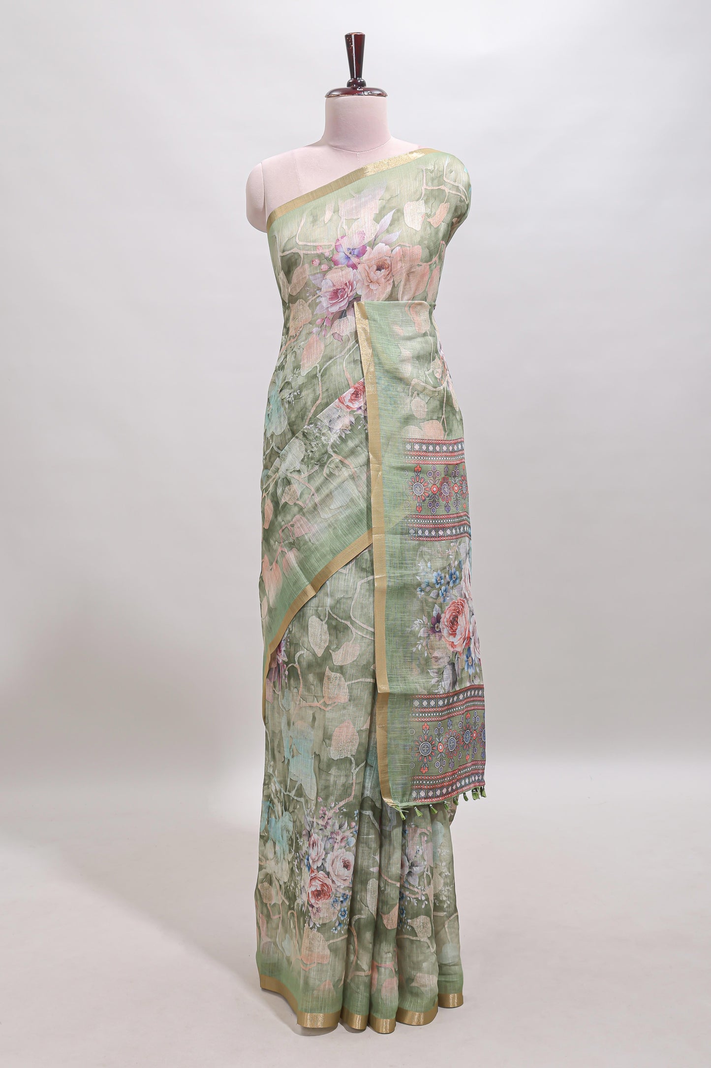 Green floral design linen cotton saree with self zari border and matching blouse