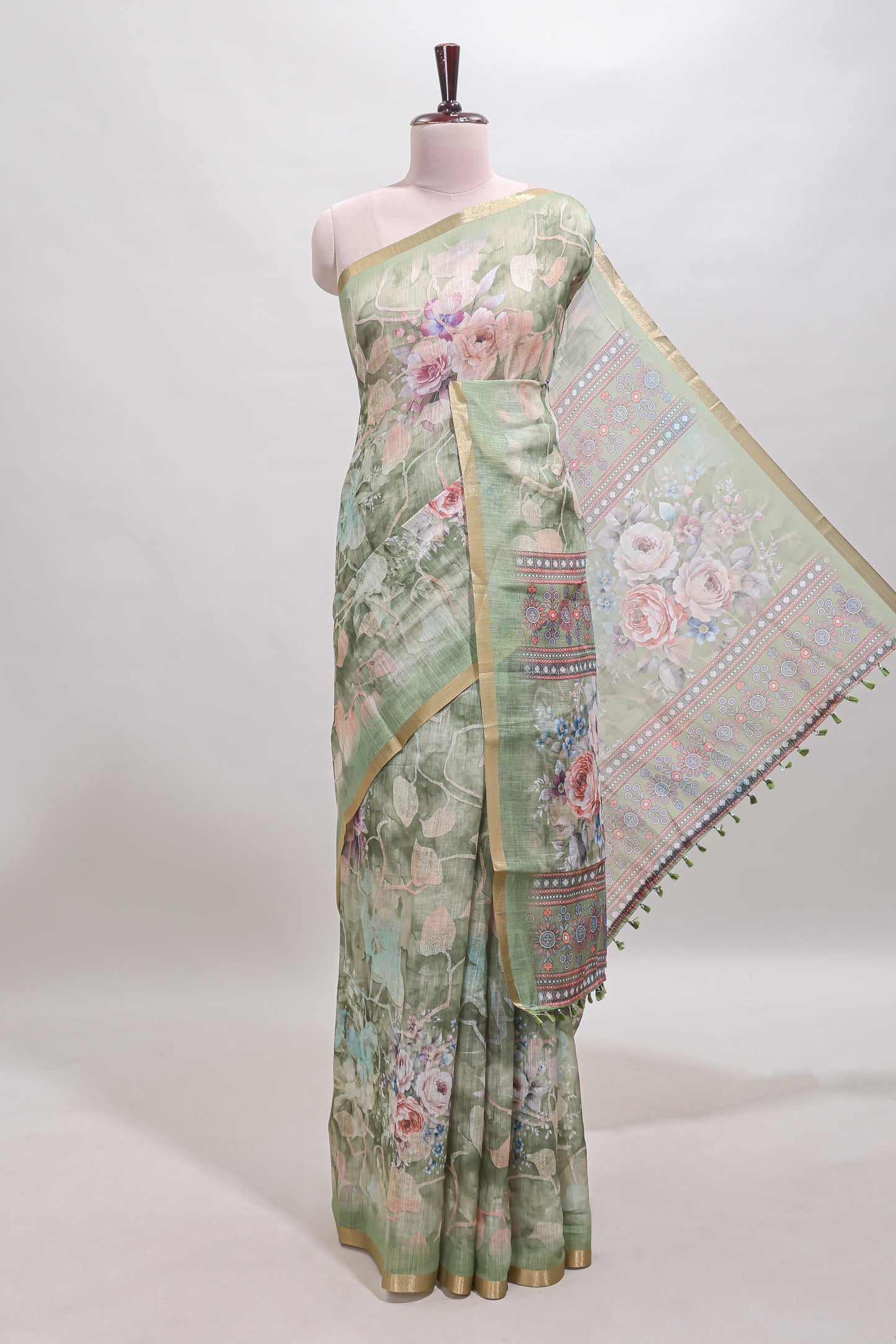 Green floral design linen cotton saree with self zari border and matching blouse