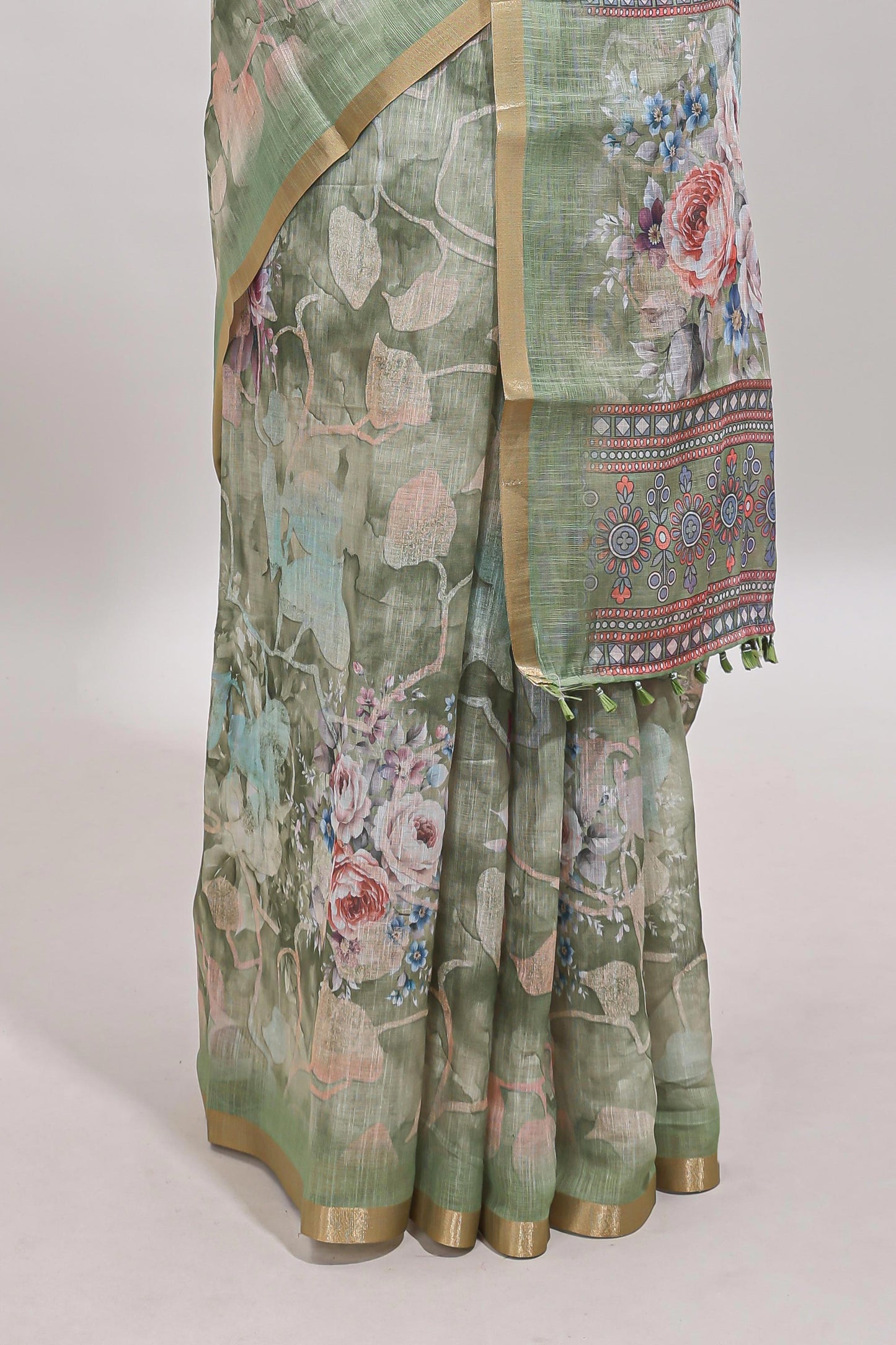 Green floral design linen cotton saree with self zari border and matching blouse