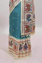 Turquoise blue checked geometric motifs linen cotton saree with contrast ikkat style border and blouse