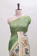 Green checked geometric motifs linen cotton saree with contrast ikkat style border and blouse