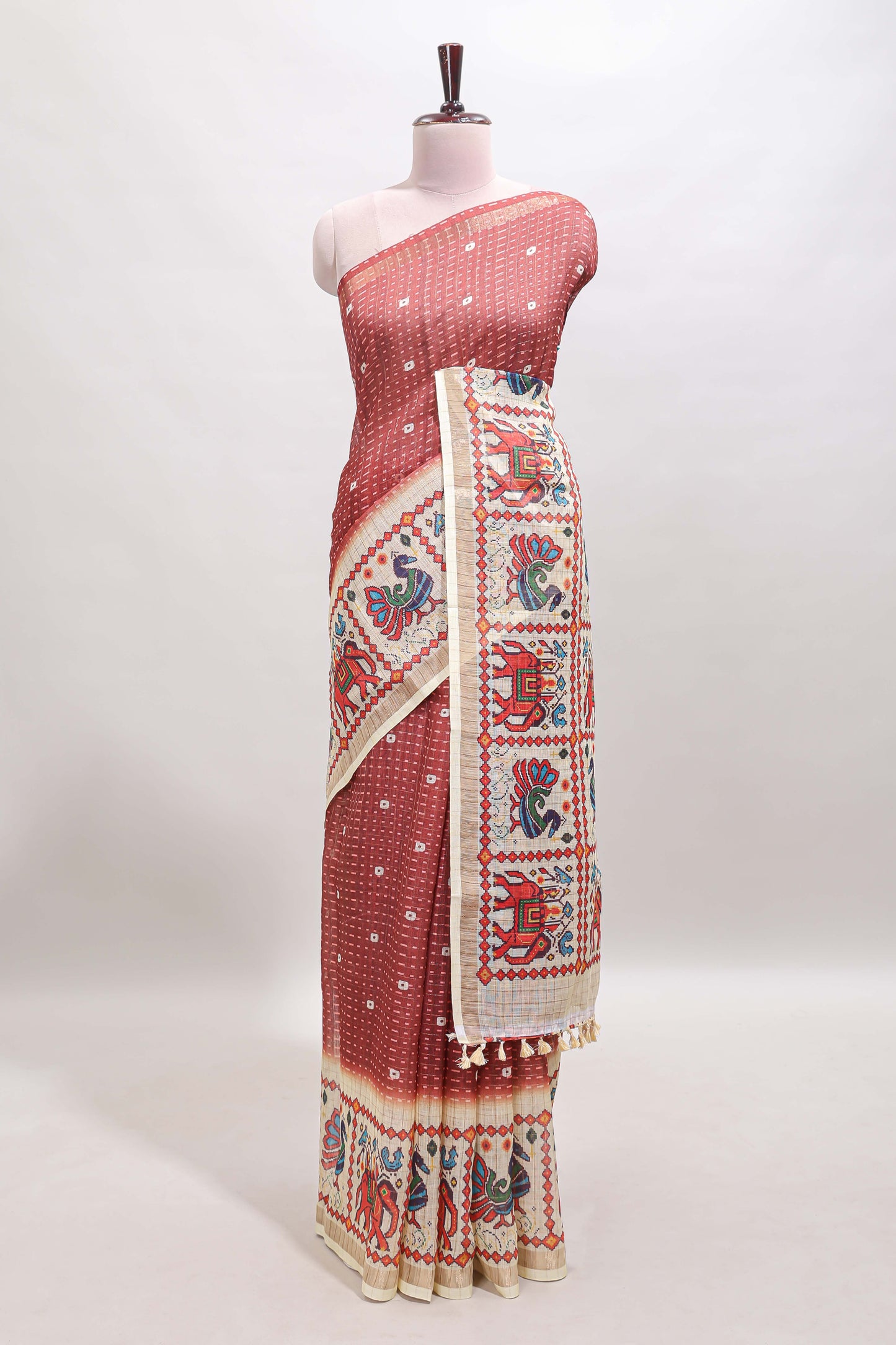 Maroon checked geometric motifs linen cotton saree with contrast ikkat style border and blouse