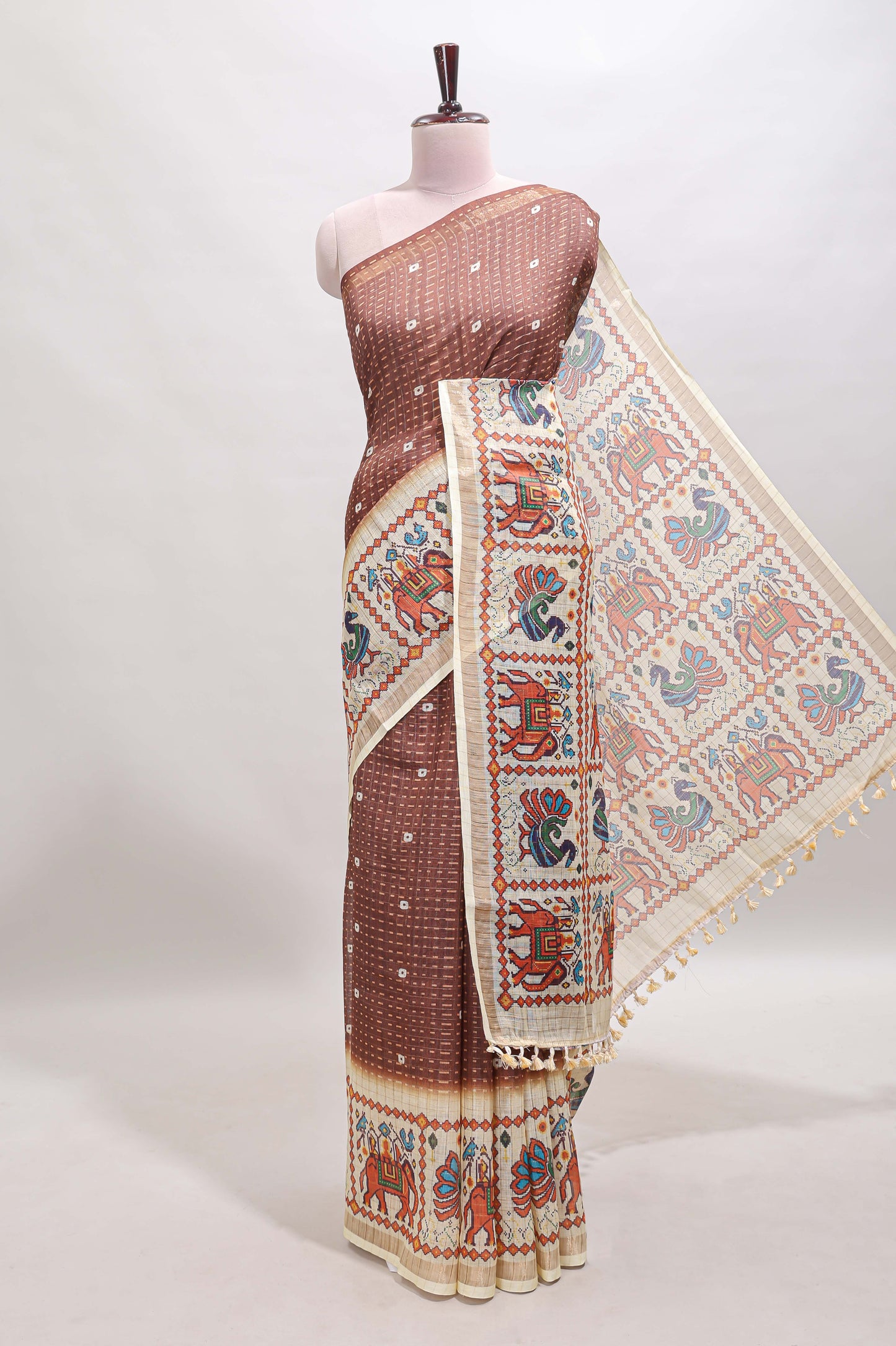 Brown checked geometric motifs linen cotton saree with contrast ikkat style border and blouse