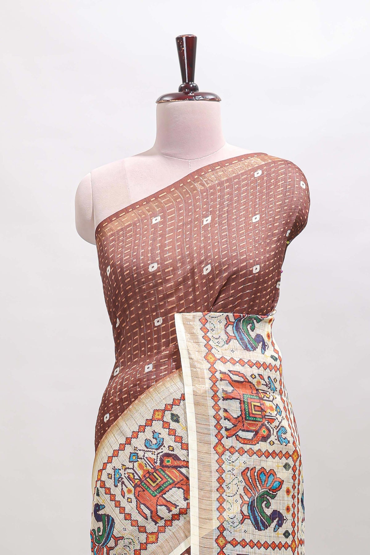 Brown checked geometric motifs linen cotton saree with contrast ikkat style border and blouse