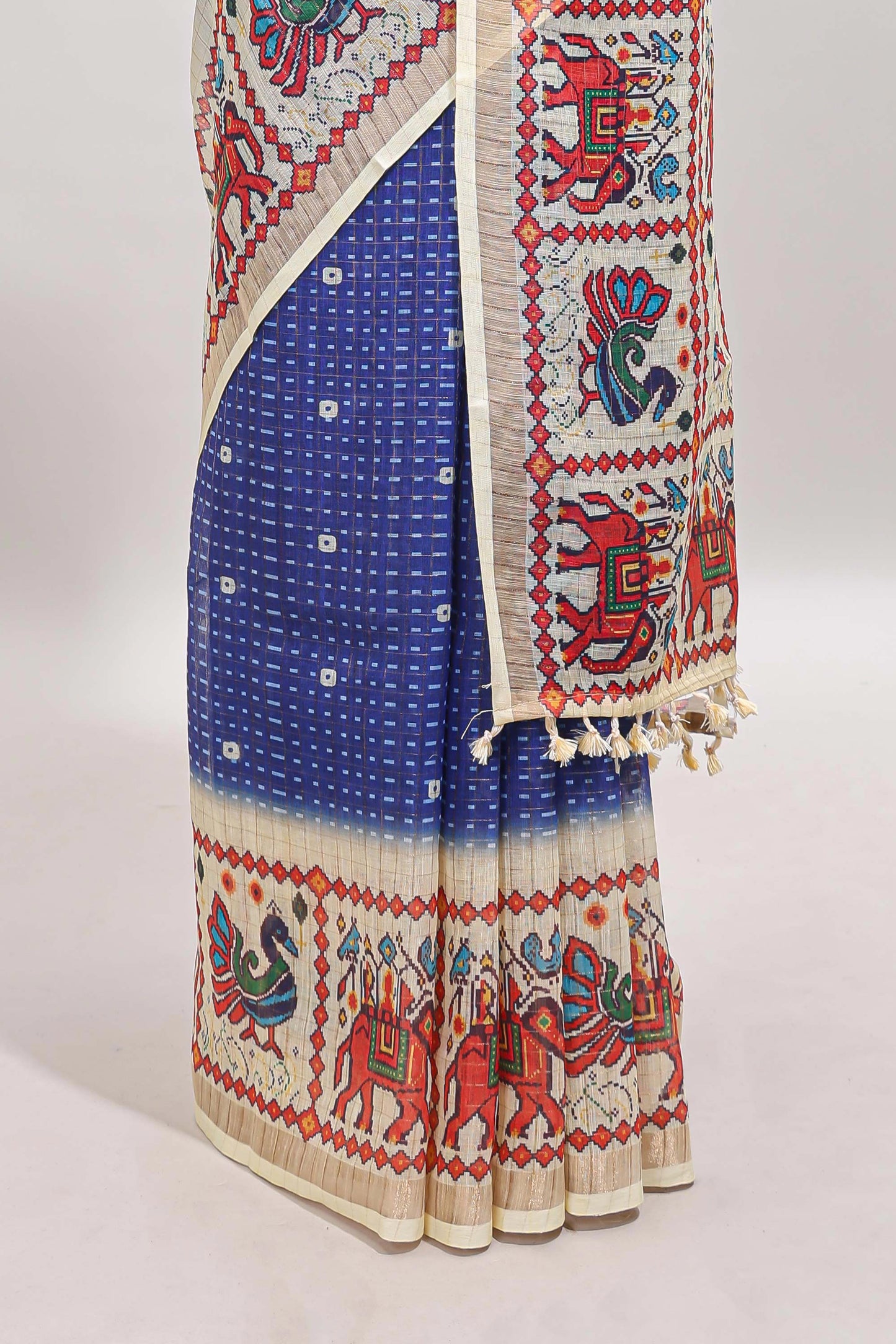 Blue checked geometric motifs linen cotton saree with contrast ikkat style border and blouse