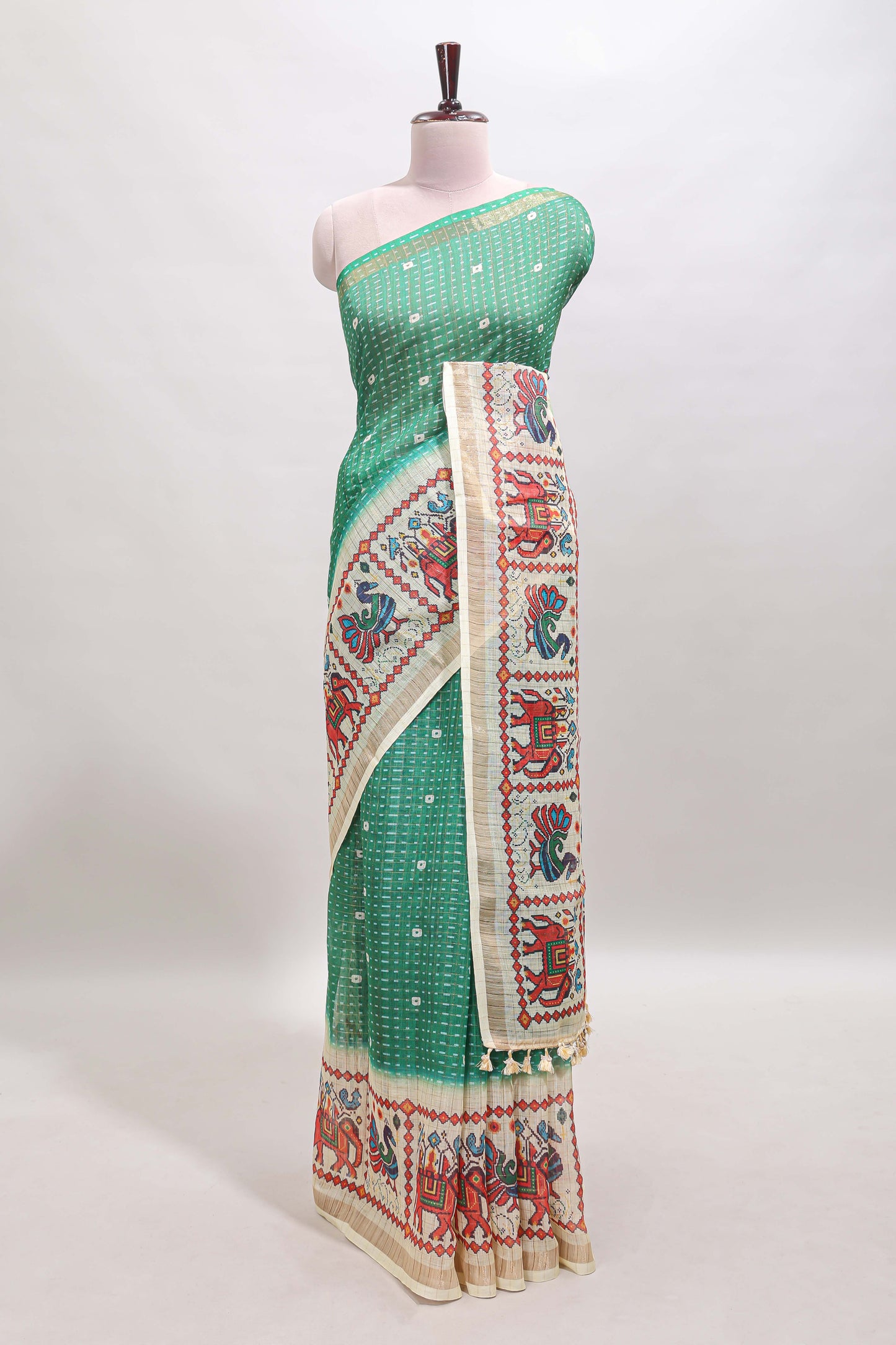 Green checked geometric motifs linen cotton saree with contrast ikkat style border and blouse