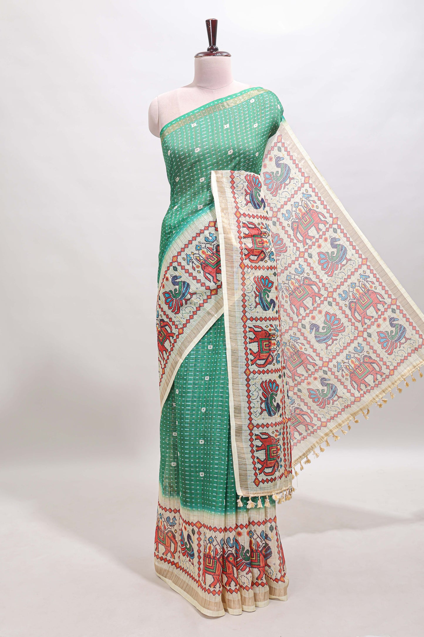 Green checked geometric motifs linen cotton saree with contrast ikkat style border and blouse