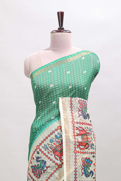 Green checked geometric motifs linen cotton saree with contrast ikkat style border and blouse