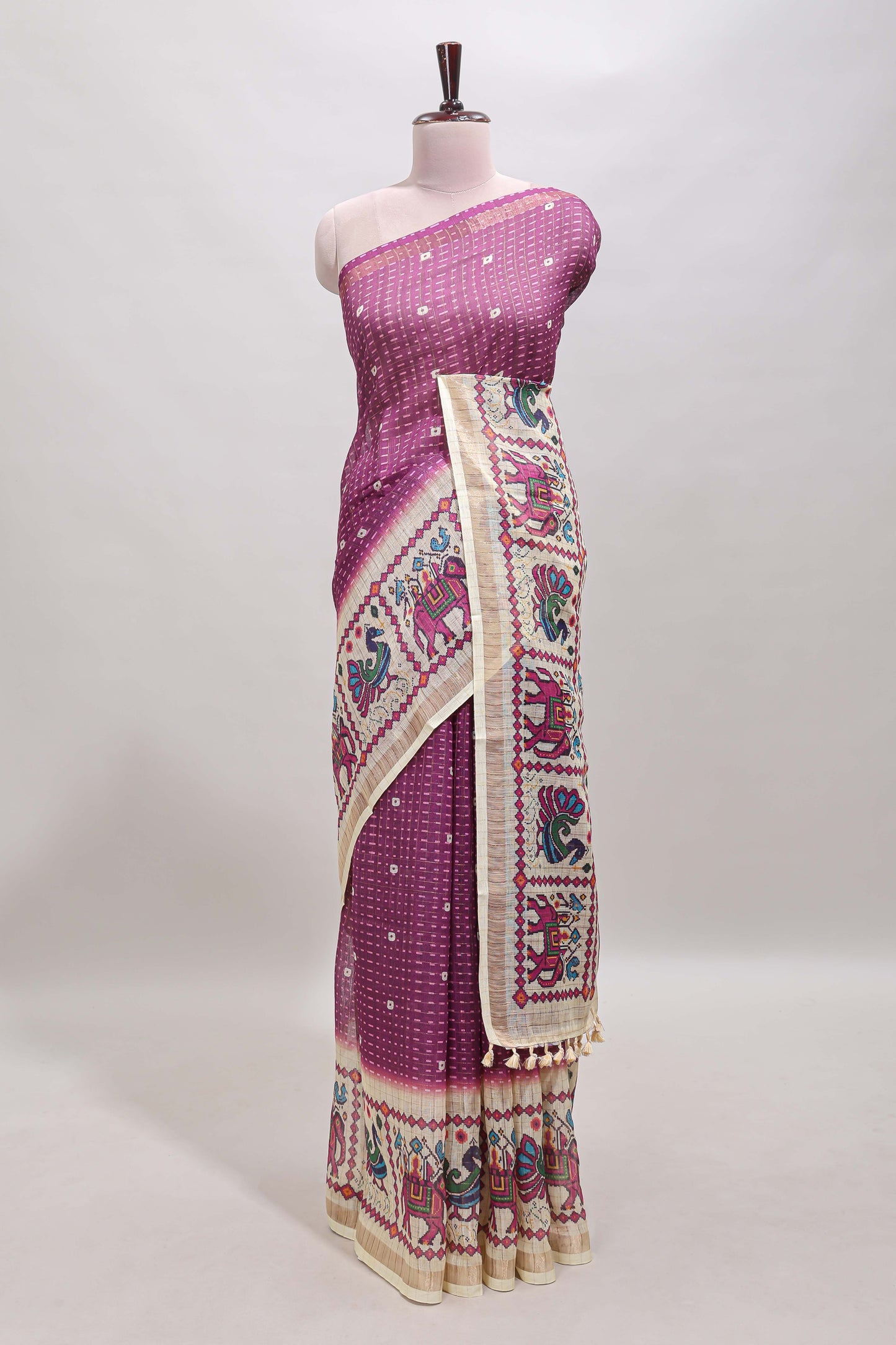 Purple checked geometric motifs linen cotton saree with contrast ikkat style border and blouse