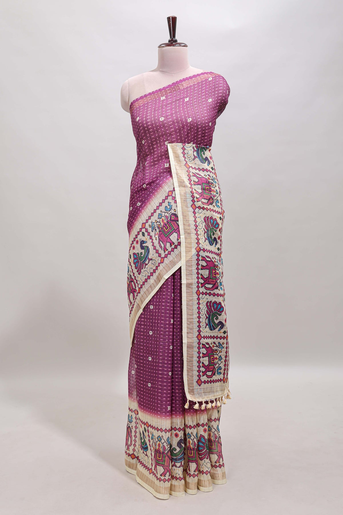Purple checked geometric motifs linen cotton saree with contrast ikkat style border and blouse