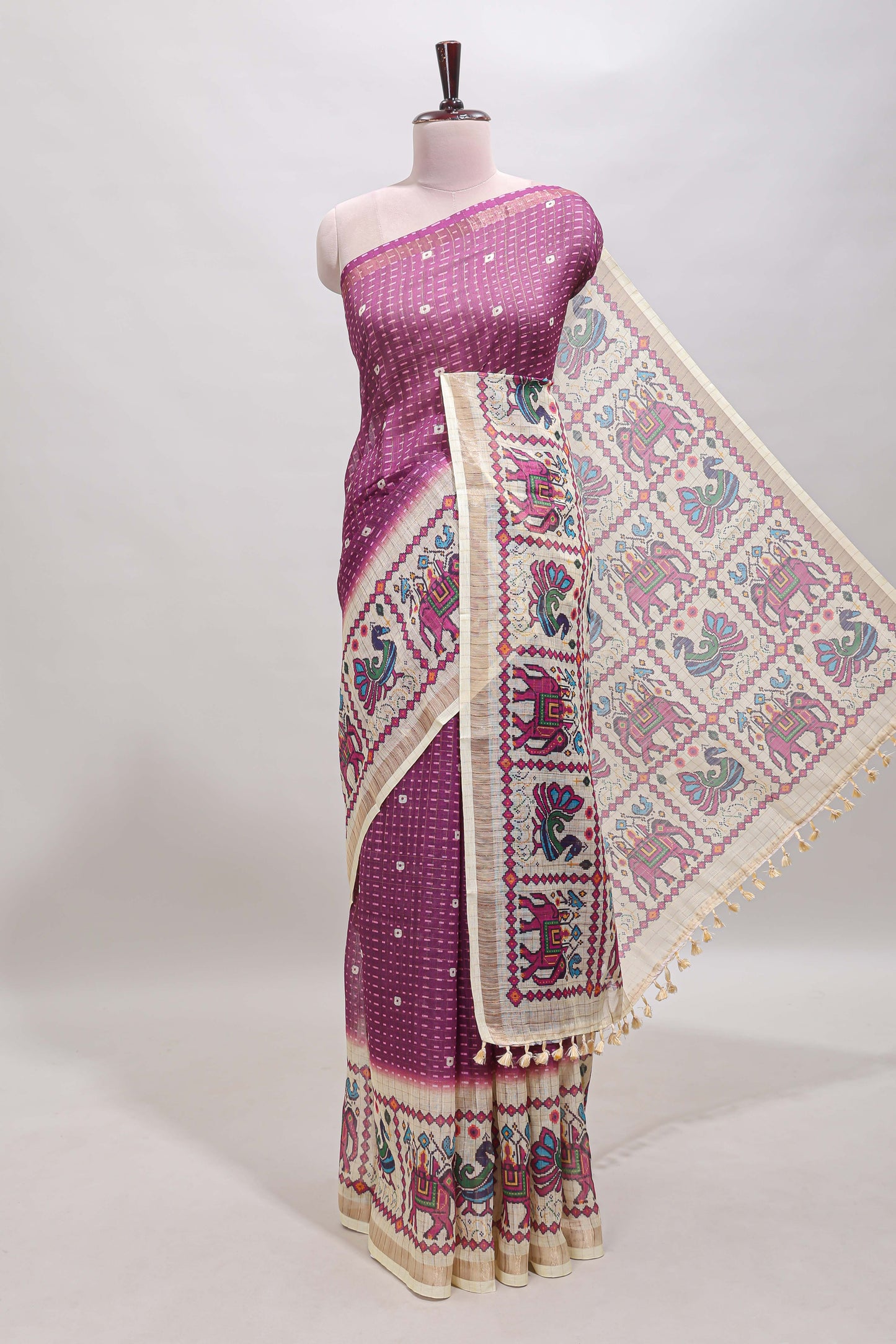 Purple checked geometric motifs linen cotton saree with contrast ikkat style border and blouse