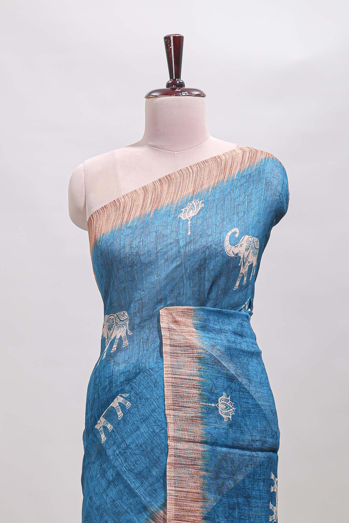 Blue floral & elephant motifs linen cotton with contrast border and matching blouse