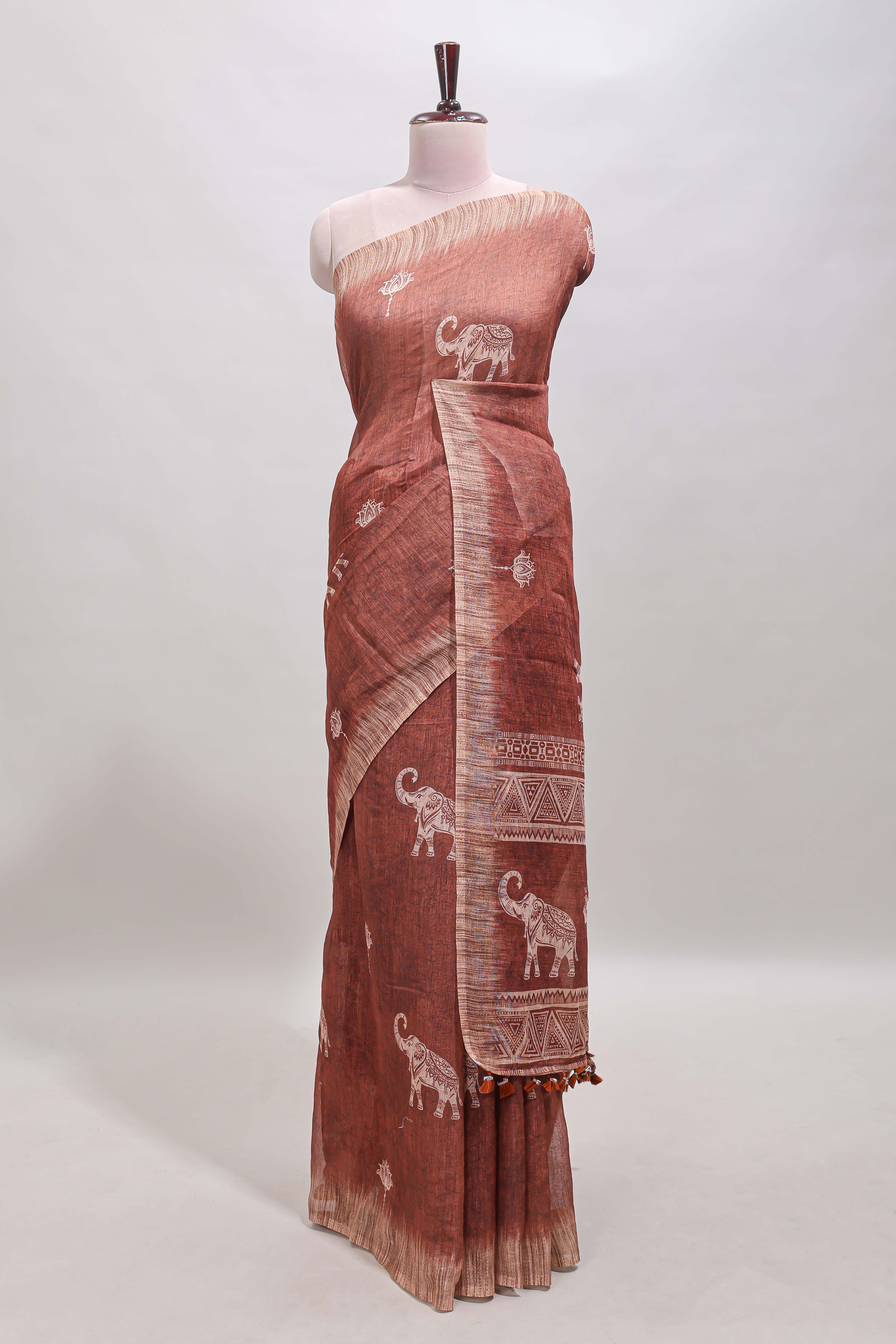 Brown floral & elephant motifs linen cotton with contrast border and matching blouse