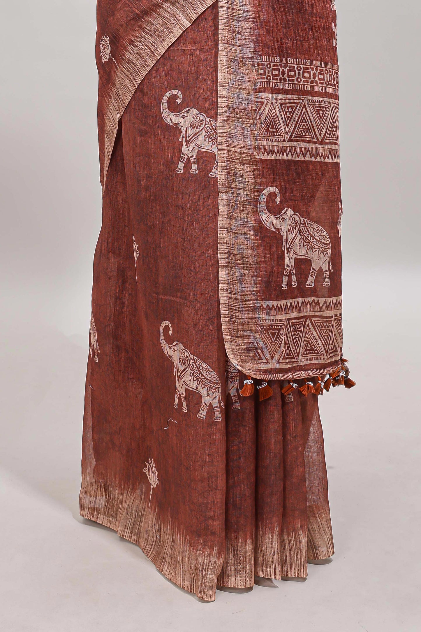 Brown floral & elephant motifs linen cotton with contrast border and matching blouse