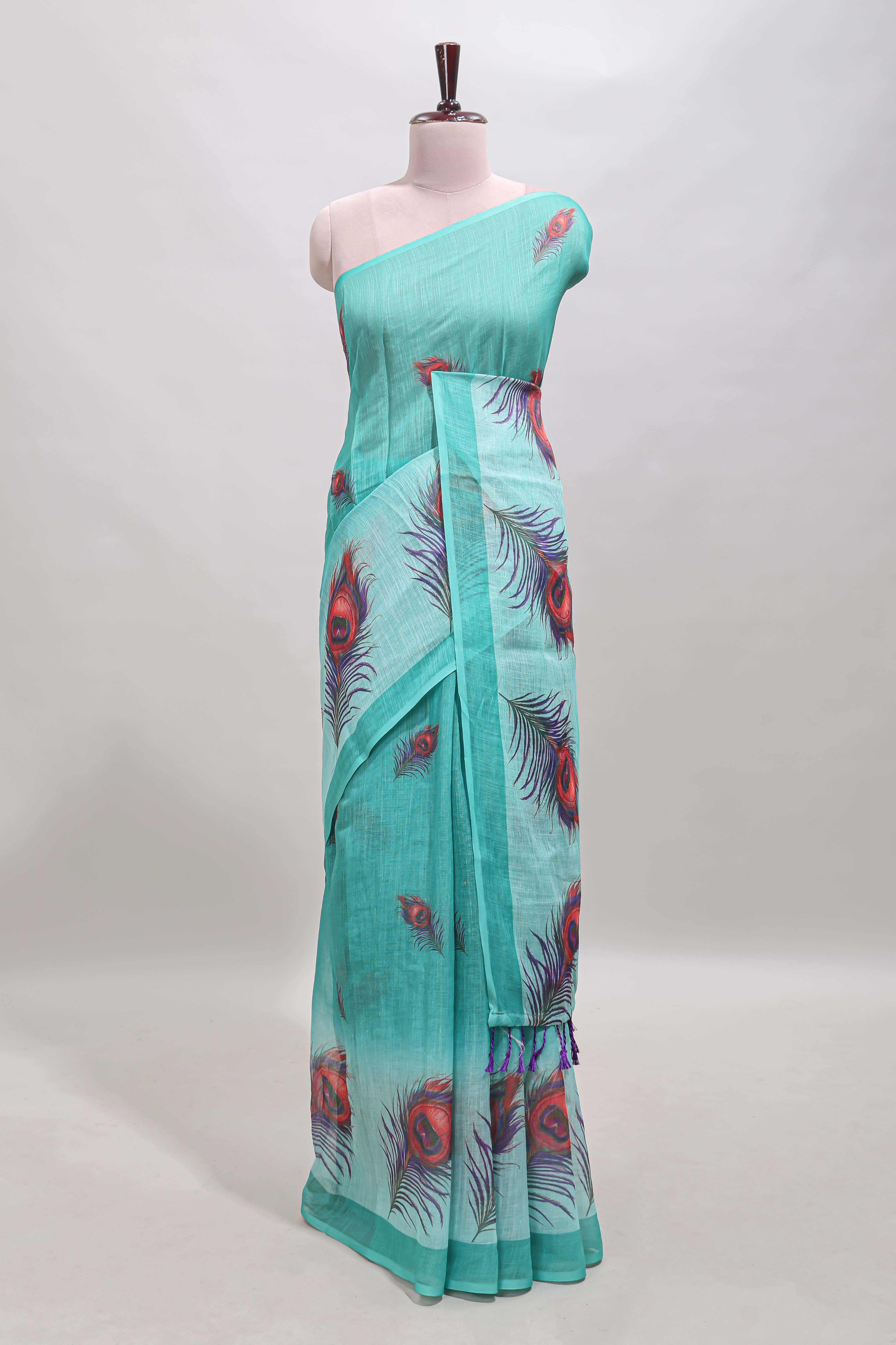 Green peacock feather motifs linen cotton saree with self border and matching blouse
