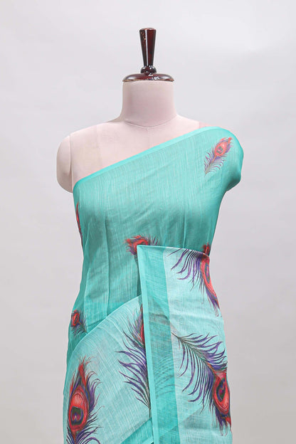 Green peacock feather motifs linen cotton saree with self border and matching blouse