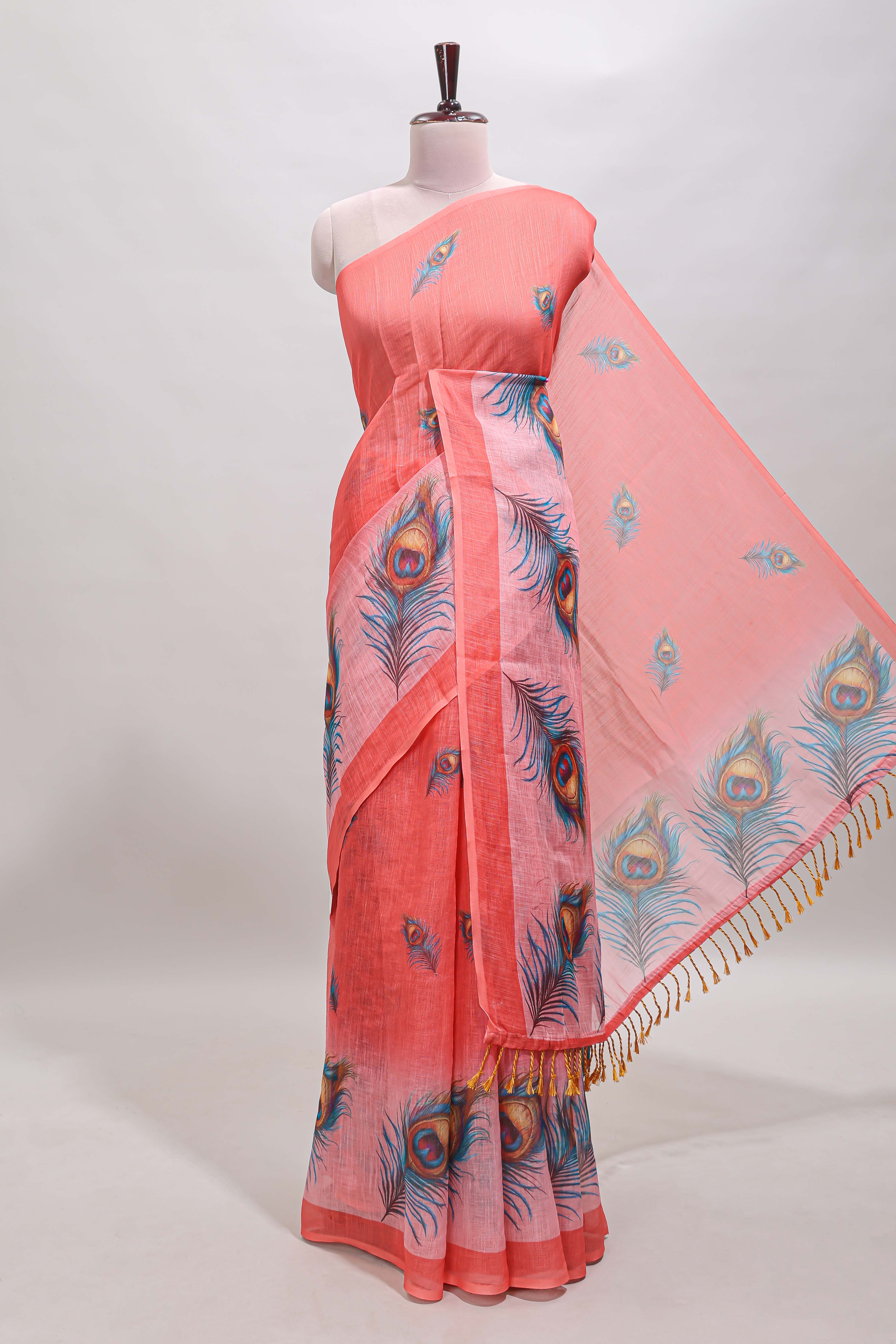 Orange peacock feather motifs linen cotton saree with self border and matching blouse