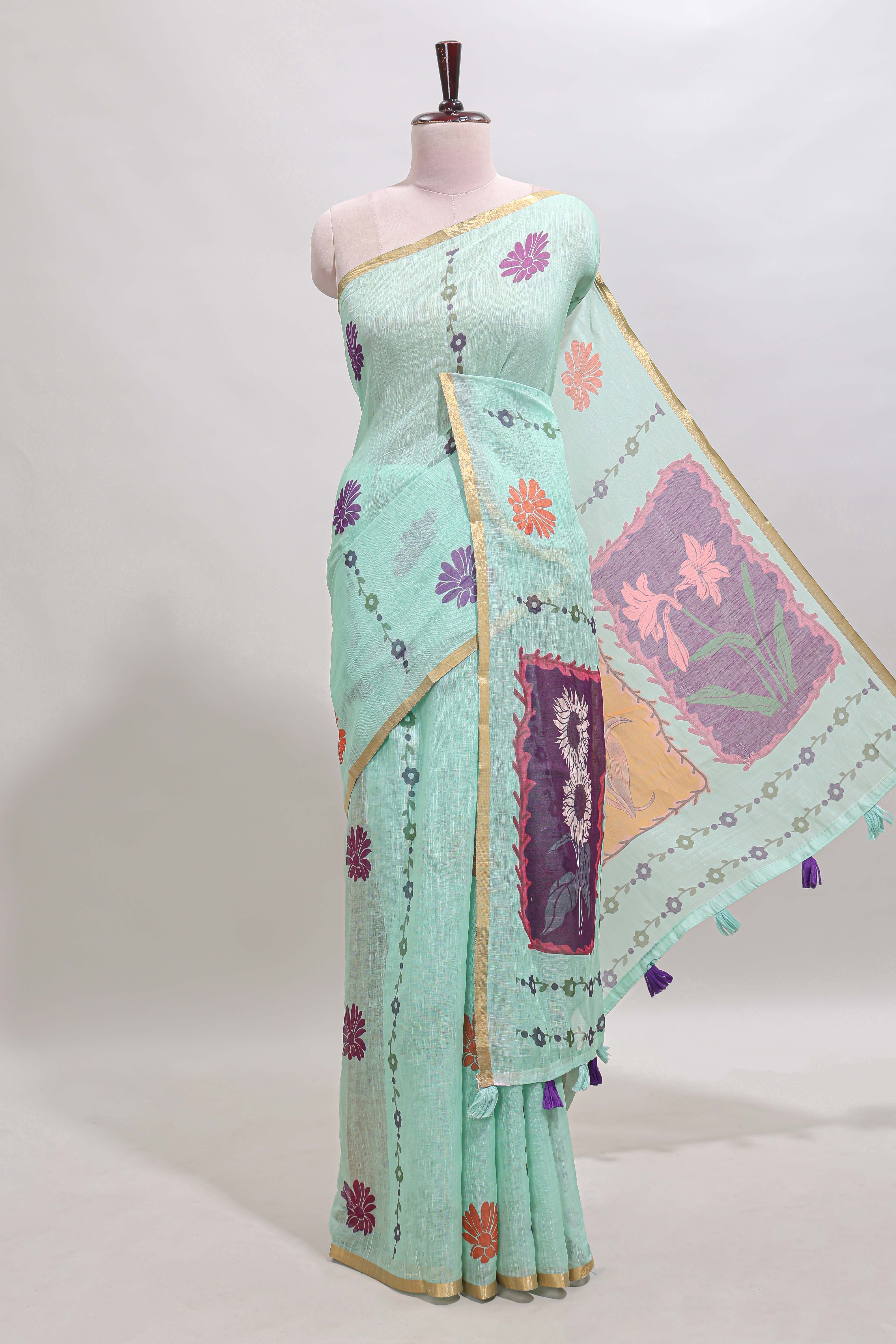 Pista green floral design linen cotton saree with self zari border and contrast blouse