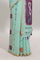 Pista green floral design linen cotton saree with self zari border and contrast blouse
