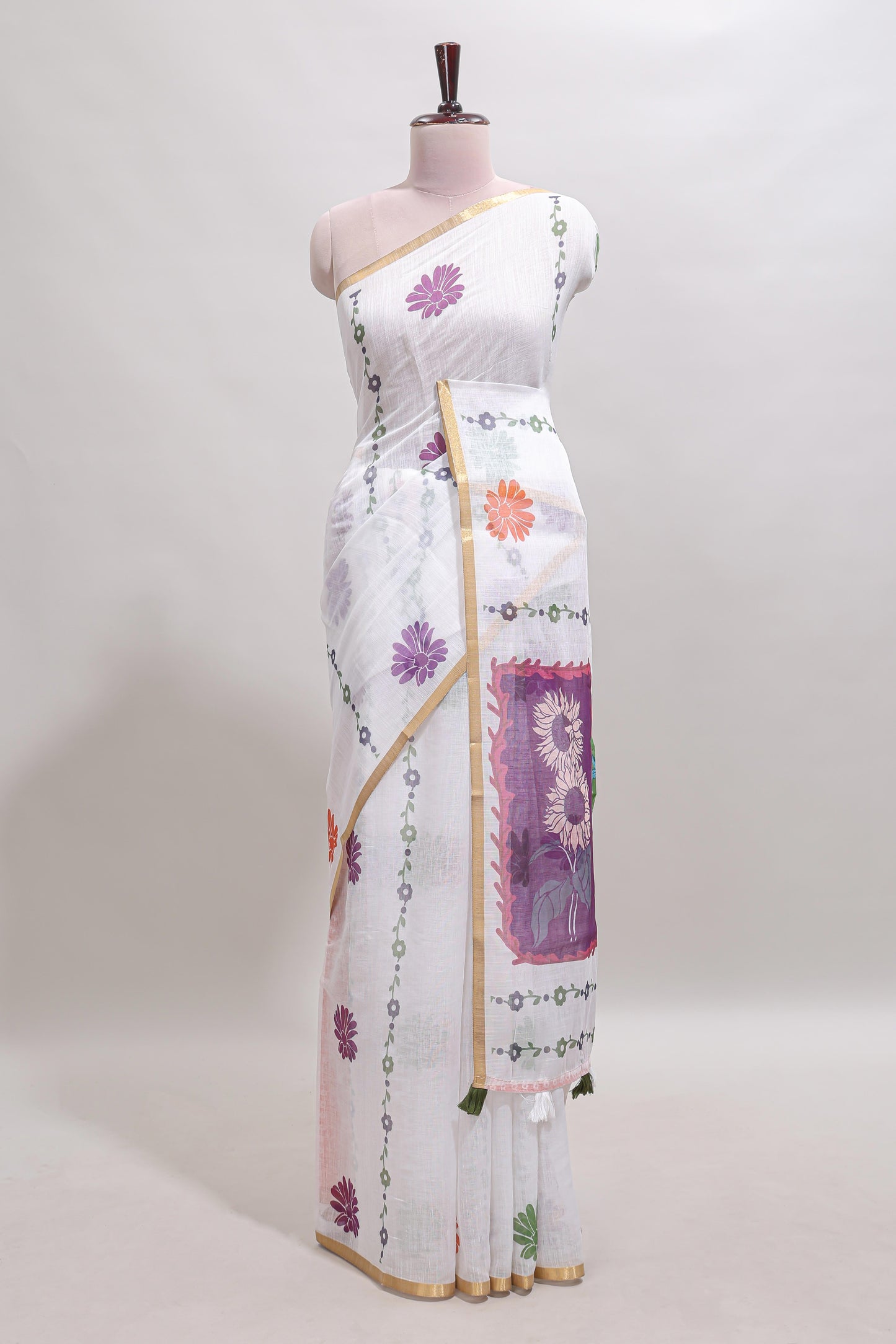 White floral design linen cotton saree with self zari border and contrast blouse