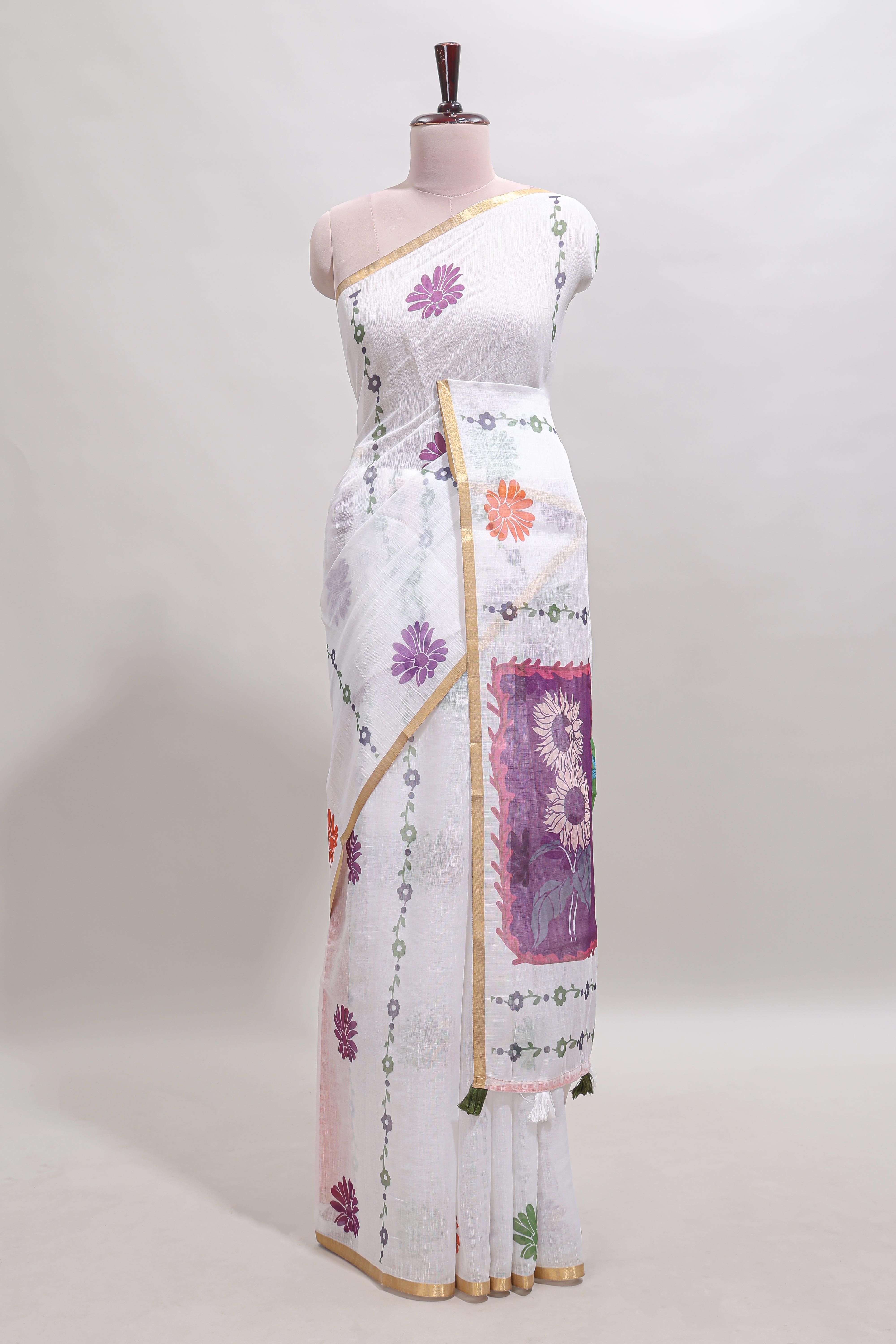 White floral design linen cotton saree with self zari border and contrast blouse