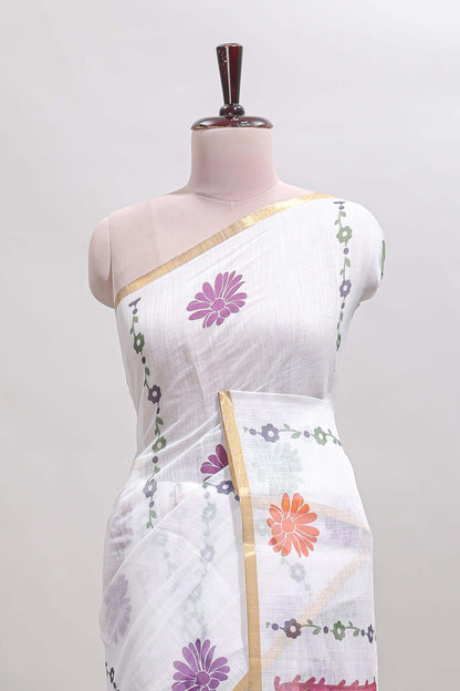 White floral design linen cotton saree with self zari border and contrast blouse