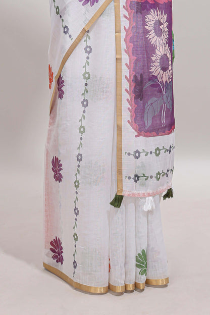White floral design linen cotton saree with self zari border and contrast blouse