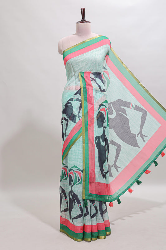 Light green artistic traditional tribal print linen cotton saree with contrast border and striped blouse