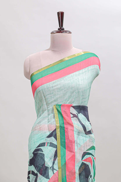 Light green artistic traditional tribal print linen cotton saree with contrast border and striped blouse