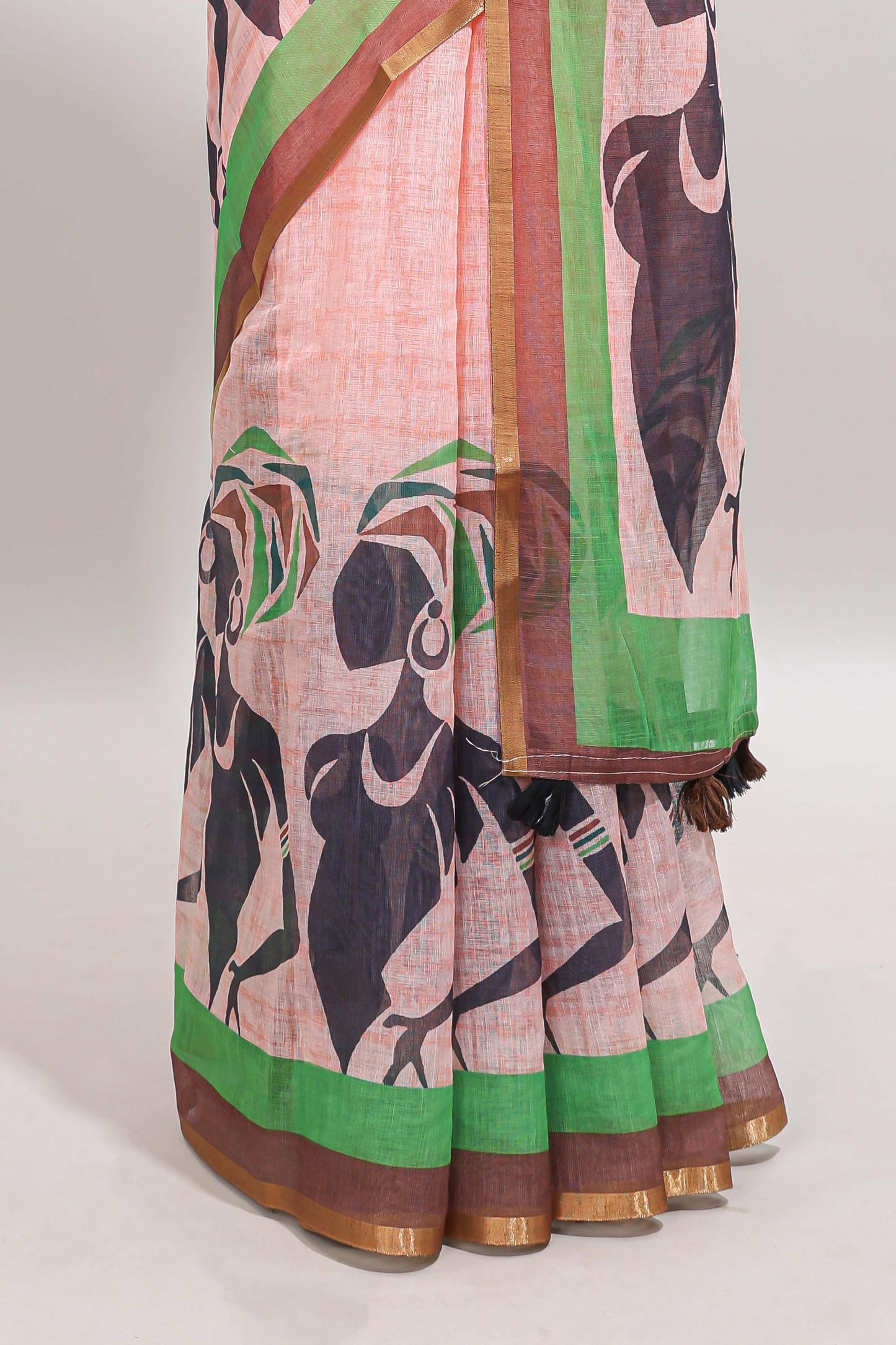 Light brown artistic traditional tribal print linen cotton saree with contrast border and striped blouse
