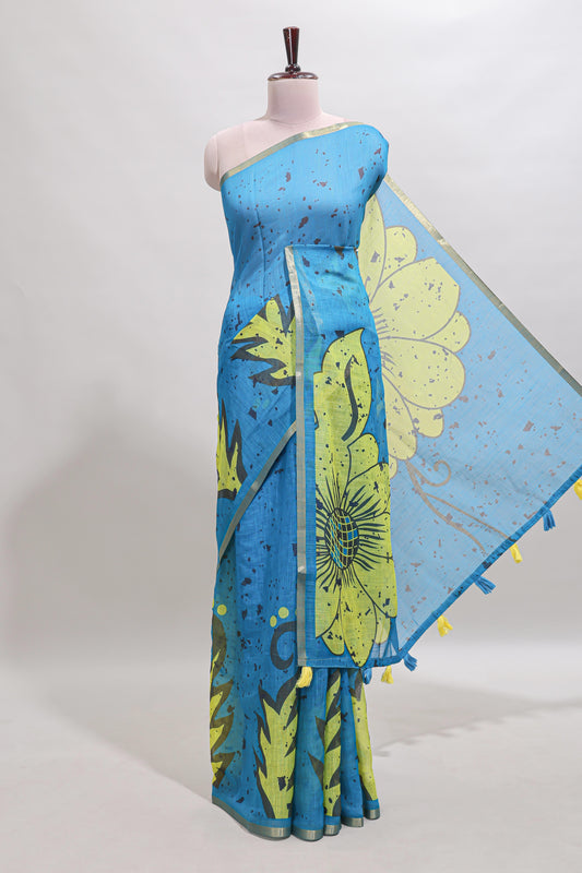 Blue floral design linen cotton saree with self zari border and contrast blouse